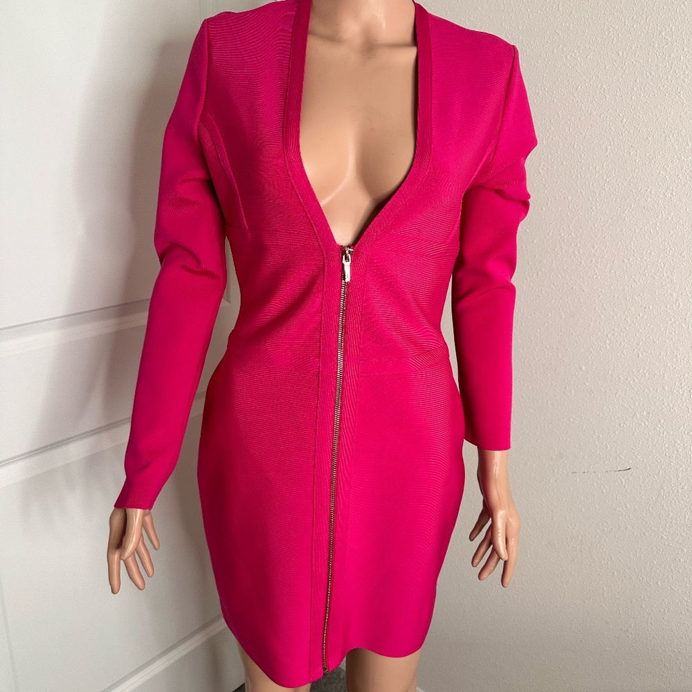 Bebe Corset Long sleeve bandage dress in color Fuchsia Fedora in size Medium.